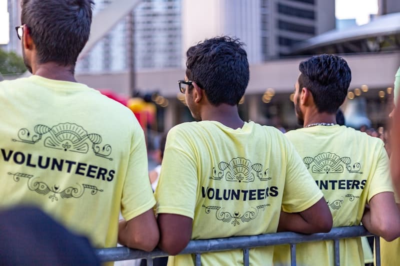 Volunteers supporting a community event